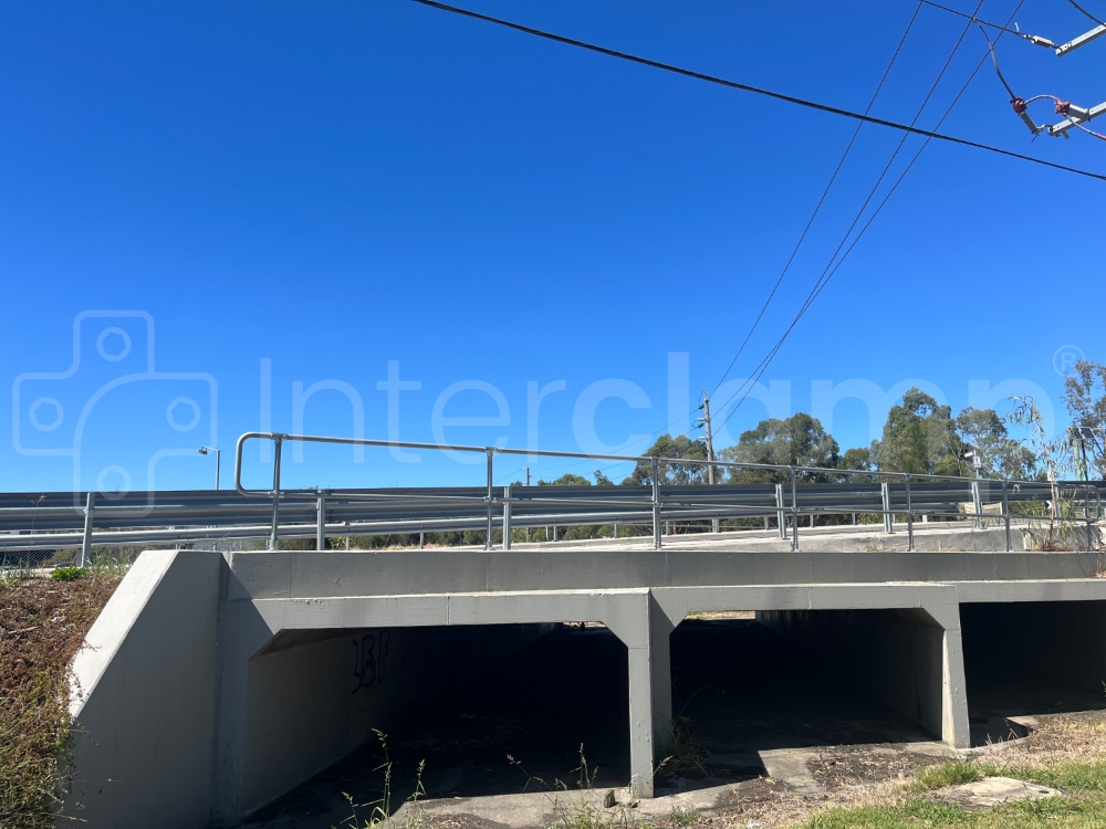 Interclamp galvanised tube clamp guardrail installed above a culvert